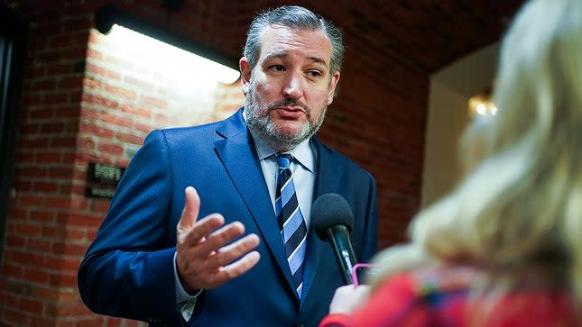 Sen. T Cruz (R-Texas) speaks to a reporter in the Senate Russell Office Building as he returns from a floor speech on Thursday, January 13, 2022. 