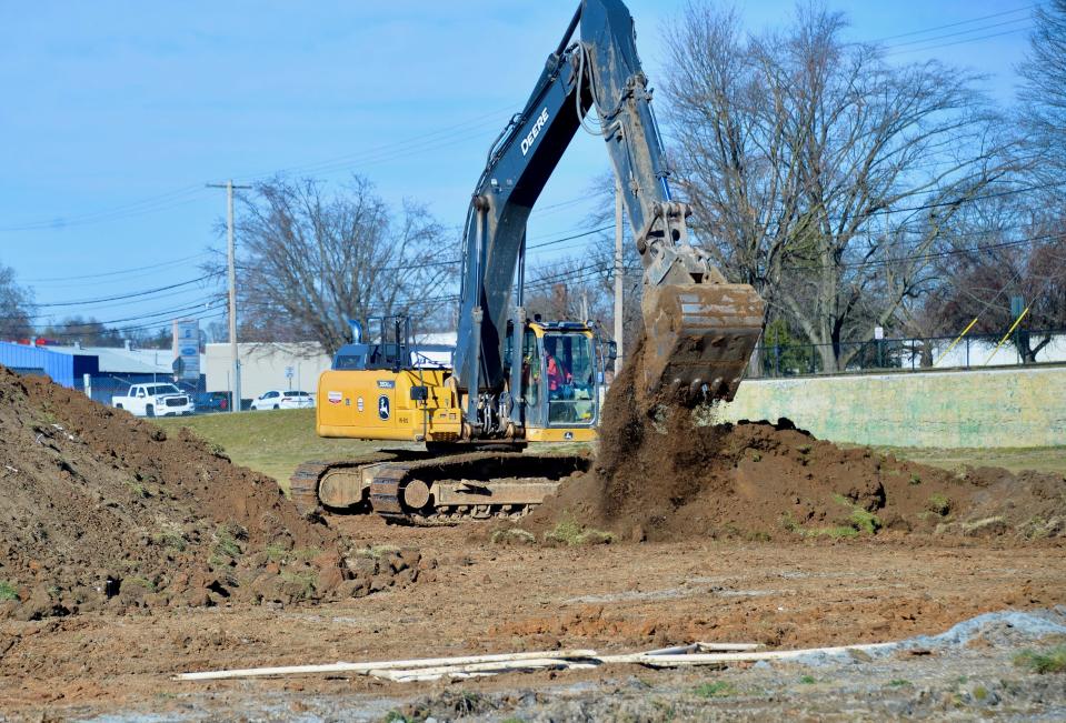 An excavator works at the site of the future Hagerstown Field House and former Municipal Stadium on Tuesday as officials prepare to hold a groundbreaking for the Field House.