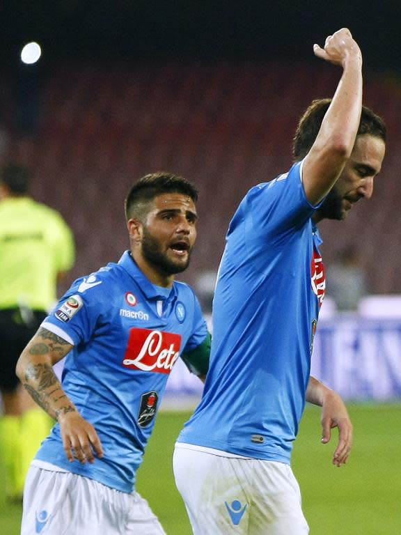 Napoli's Gonzalo Higuain (R) celebrates with teammate Lorenzo Insigne after scoring during the Serie A match against Sampdoria on April 26, 2015 at the San Paolo stadium