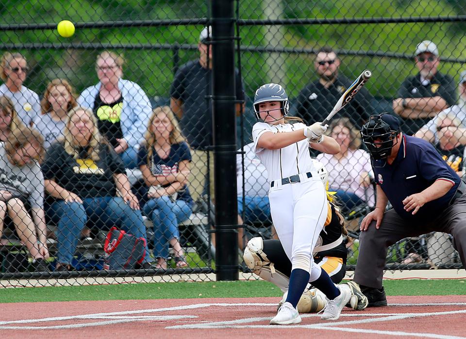 Hillsdale High School's Mollie Goon (6) connects with a pitch for a base hit in the first nning against Bristol High School during their OHSAA Division IV regional semifinal softball game Wednesday, May 25, 2022 at Berea-Midpark High School. TOM E. PUSKAR/TIMES-GAZETTE.COM