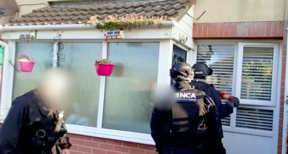 Officers during early morning raids in County Durham on Wednesday. (National Crime Agency/PA)