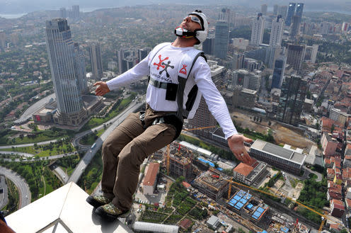 <span class="caption">Spine-tingling or simply scary?</span> <span class="attribution"><a class="link " href="https://en.wikipedia.org/wiki/BASE_jumping#/media/File:BASE_Jumping_from_Sapphire_Tower_in_Istanbul.jpg" rel="nofollow noopener" target="_blank" data-ylk="slk:Kontizas Dimitrios/wikimedia;elm:context_link;itc:0;sec:content-canvas">Kontizas Dimitrios/wikimedia</a>, <a class="link " href="http://creativecommons.org/licenses/by-sa/4.0/" rel="nofollow noopener" target="_blank" data-ylk="slk:CC BY-SA;elm:context_link;itc:0;sec:content-canvas">CC BY-SA</a></span>