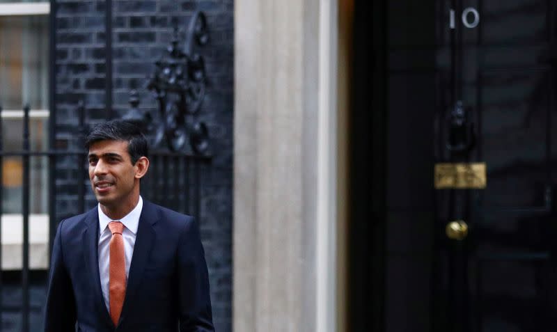 FILE PHOTO: Newly appointed Britain’s Chancellor of the Exchequer Rishi Sunak leaves Downing Street 10 in London