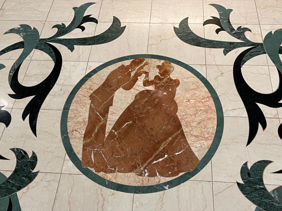 prince charming and cinderella motif on the ground of the lobby in disney's grand floridian resort