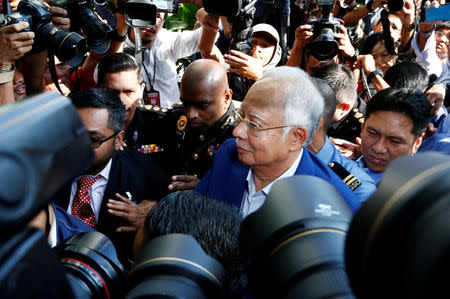 Malaysia's former prime minister Najib Razak arrives to give a statement to the Malaysian Anti-Corruption Commission (MACC) in Putrajaya, Malaysia May 22, 2018. REUTERS/Lai Seng Sin