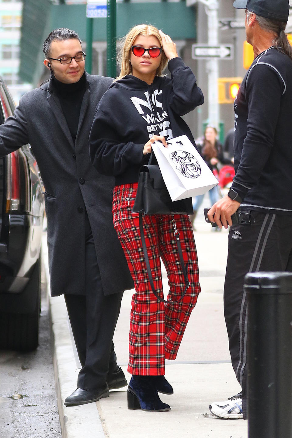 <p>Sofia Richie also sported the plaid style earlier this year. She paired them with a hoodie, tinted shades, and heeled booties. (Photo: AKM-GSI) </p>