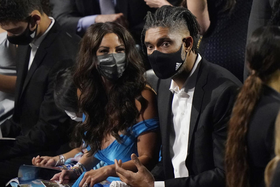 Tim Duncan, right, looks on before the 2020 Basketball Hall of Fame enshrinement ceremony, Saturday, May 15, 2021, in Uncasville, Conn. (AP Photo/Kathy Willens)