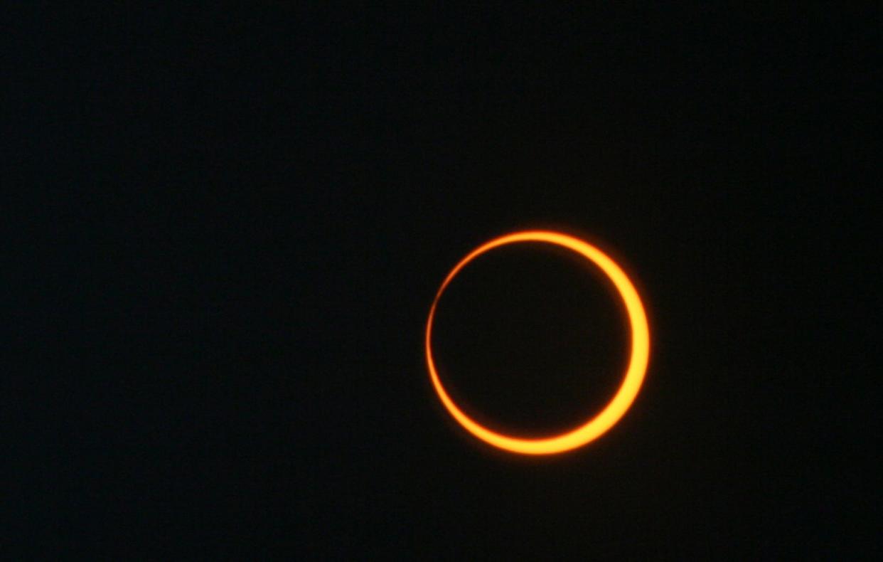 A ‘ring of fire’ around the moon is visible during an annular eclipse in this photo from The Institute.