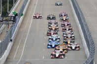 Drivers take the green flag at the start of the Music City Grand Prix auto race Sunday, Aug. 7, 2022, in Nashville, Tenn. (AP Photo/Mark Humphrey)