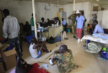 Wounded South Sudan military personnel receive medical treatment at the general military hospital in the capital Juba December 28, 2013. REUTERS/James Akena