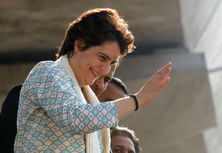 Priyanka Gandhi Vadra, a leader of India's main opposition Congress party and sister of the party president Rahul Gandhi, waves to her supporters during a roadshow in Lucknow, February 11, 2019. REUTERS/Pawan Kumar