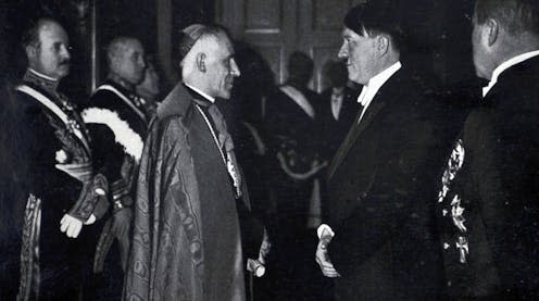 <span class="caption">Appeasement: Adolph Hitler meeting Cesare Orsenigo, the papal nuncio to Germany, in 1935</span> <span class="attribution"><span class="source">US Holocaust Museum/Wikimedia Commons</span></span>