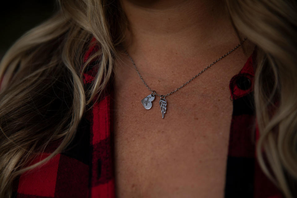 Tara wears a necklace in honor of her son, Griffyn.<span class="copyright">Maddie McGarvey for TIME</span>