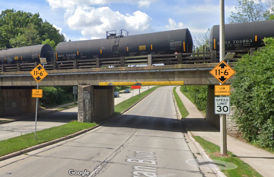 A view looking south of the railroad bridge over Swan Boulevard in Wauwatosa, a span dubbed the "Swan Slicer" for the number of times too-tall trucks have tried to pass underneath it.