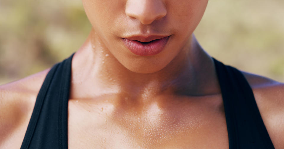 Closeup shot of an unrecognizable woman out for a run