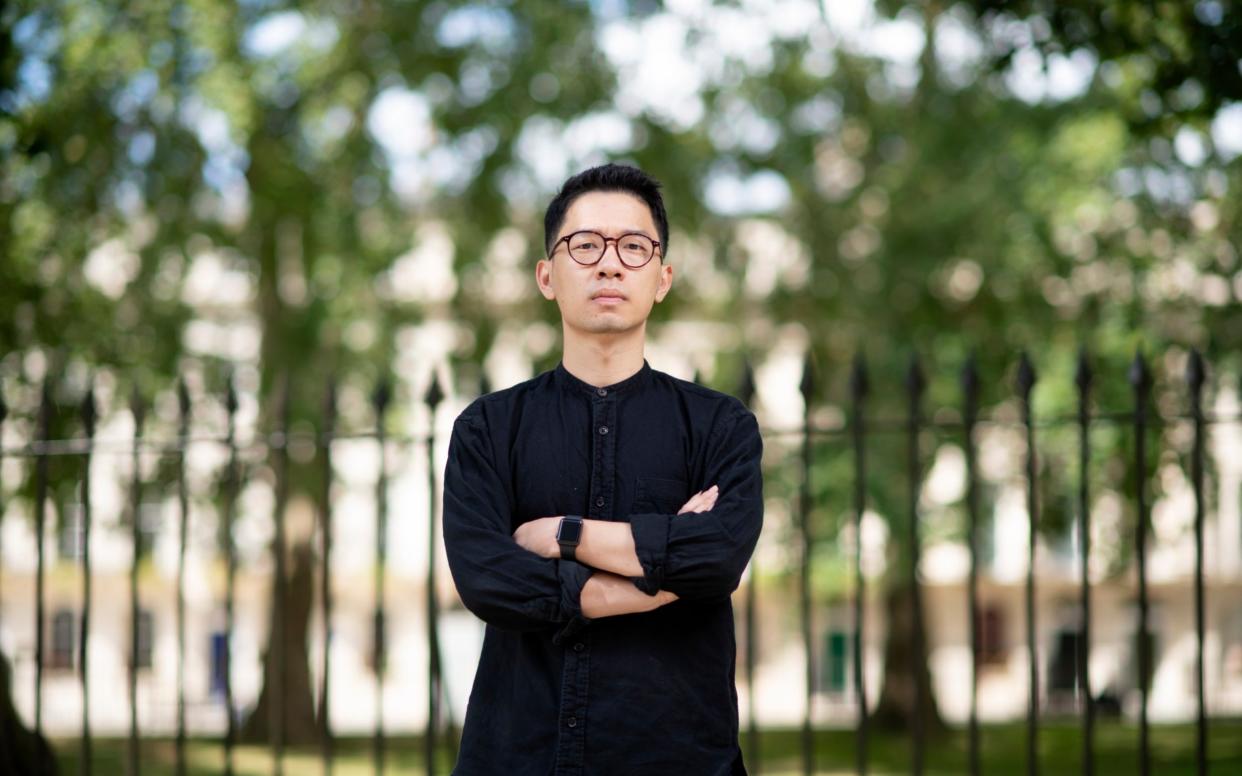 Nathan Law, pictured last month in London, is one of the six pro-democracy activists the Hong Kong police want arrested  - Geoff Pugh for The Telegraph 