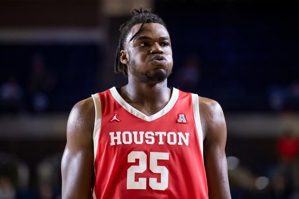 Houston Cougars freshman Jarace Walker exhales as he comes to the bench in the closing minutes of a 81-55 rout over St. Joseph's during the Veterans Classic at Navy's Alumni Hall on Friday, Nov. 11, 2022, in Annapolis, Md. Walker led all scorers with 23 points and had eight rebounds, two steals and two assists in 32 minutes of play.