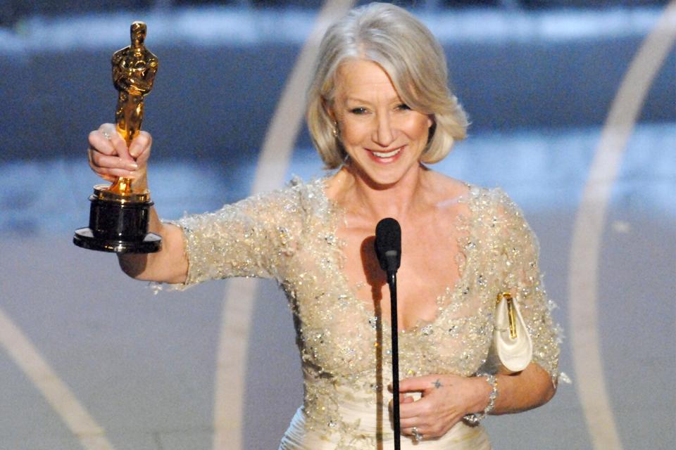 Helen Mirren accepts Best Actress in a Leading Role award for ?The Queen? at the Kodak Theatre in Los Angeles, California (Photo by Michael Caulfield/WireImage)