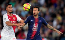 Soccer Football - Ligue 1 - Paris St Germain v AS Monaco - Parc des Princes, Paris, France - April 21, 2019 AS Monaco's Benjamin Henrichs in action with Paris St Germain's Neymar REUTERS/Gonzalo Fuentes