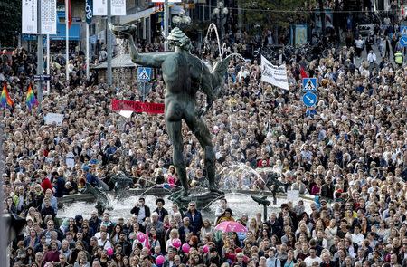 People attend a 'Refugees Welcome' demonstration at the Gotaplatsen square in Gothenburg, Sweden, in this September 9, 2015 file photo. REUTERS/Adam Ihse/TT News Agency/Files