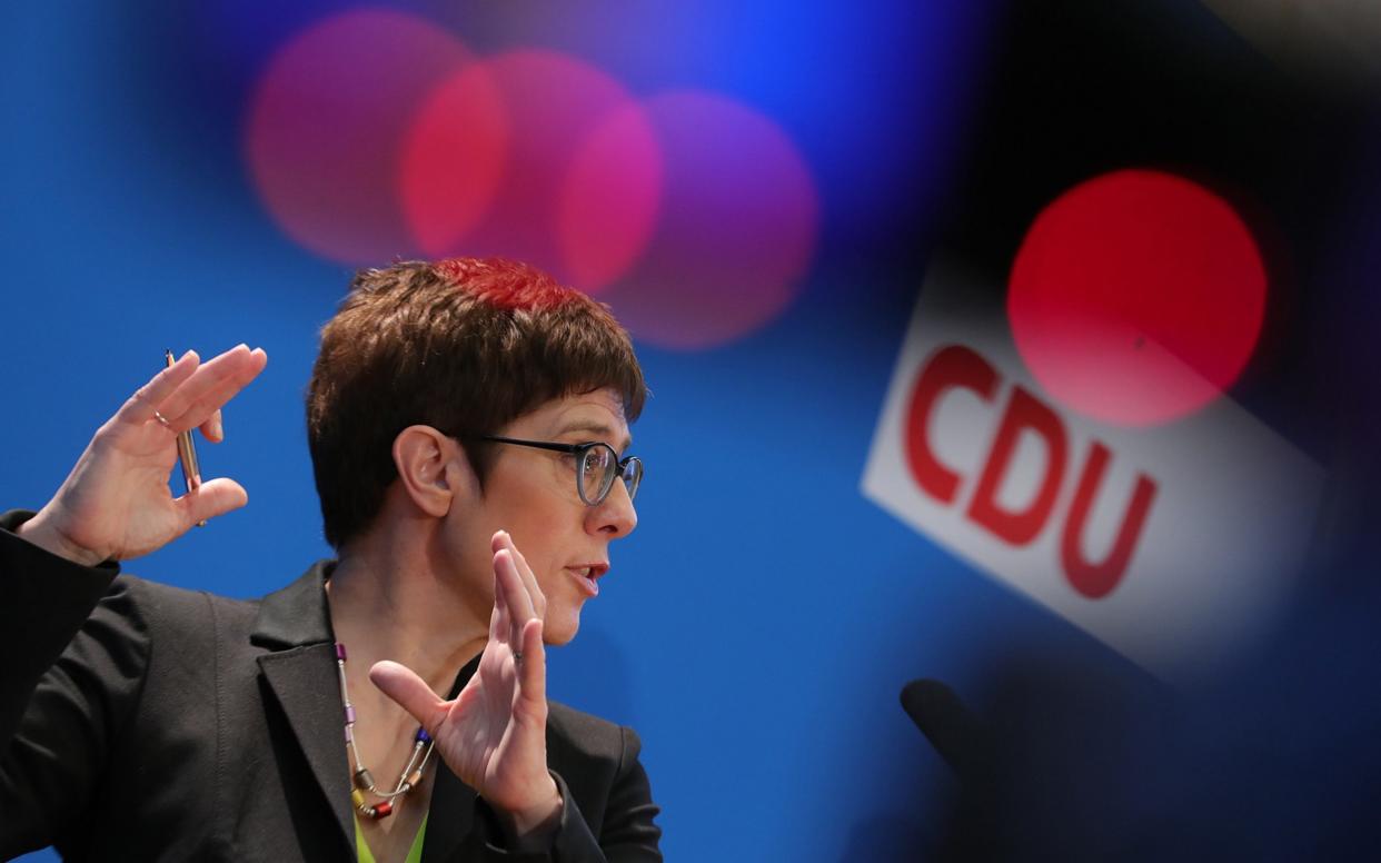 Annegret Kramp-Karrenbauer, one of the frontrunners to replace Angela Merkel at the head of the Christian Democrat Party (CDU) is trying to distance herself from the chancellor's controversial migrant policy - Bloomberg