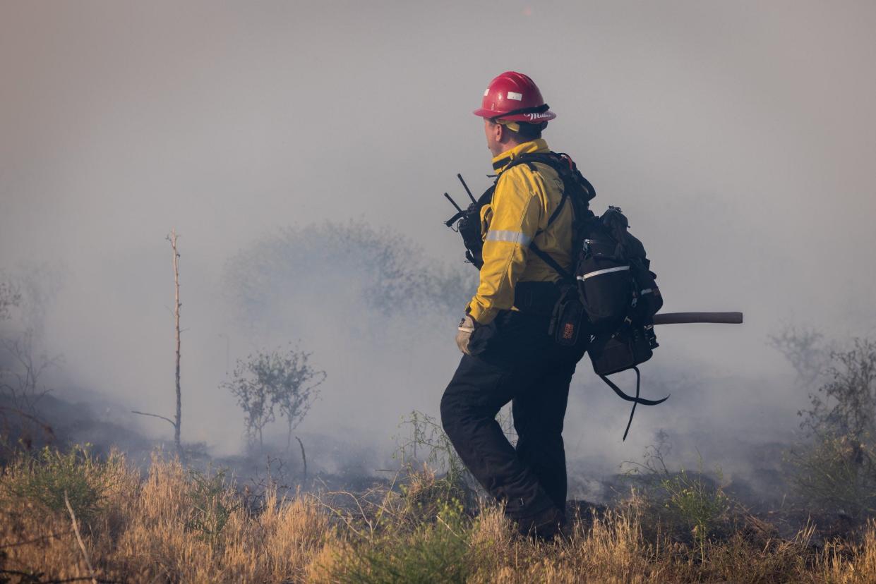 Firefighters from multiple agencies on Tuesday continued to hold the Hesperia Fire at 95 acres,with 70% containment. The vegetation fire began Monday night in the area of Highway 173 and 138 near Silverwood Lake.