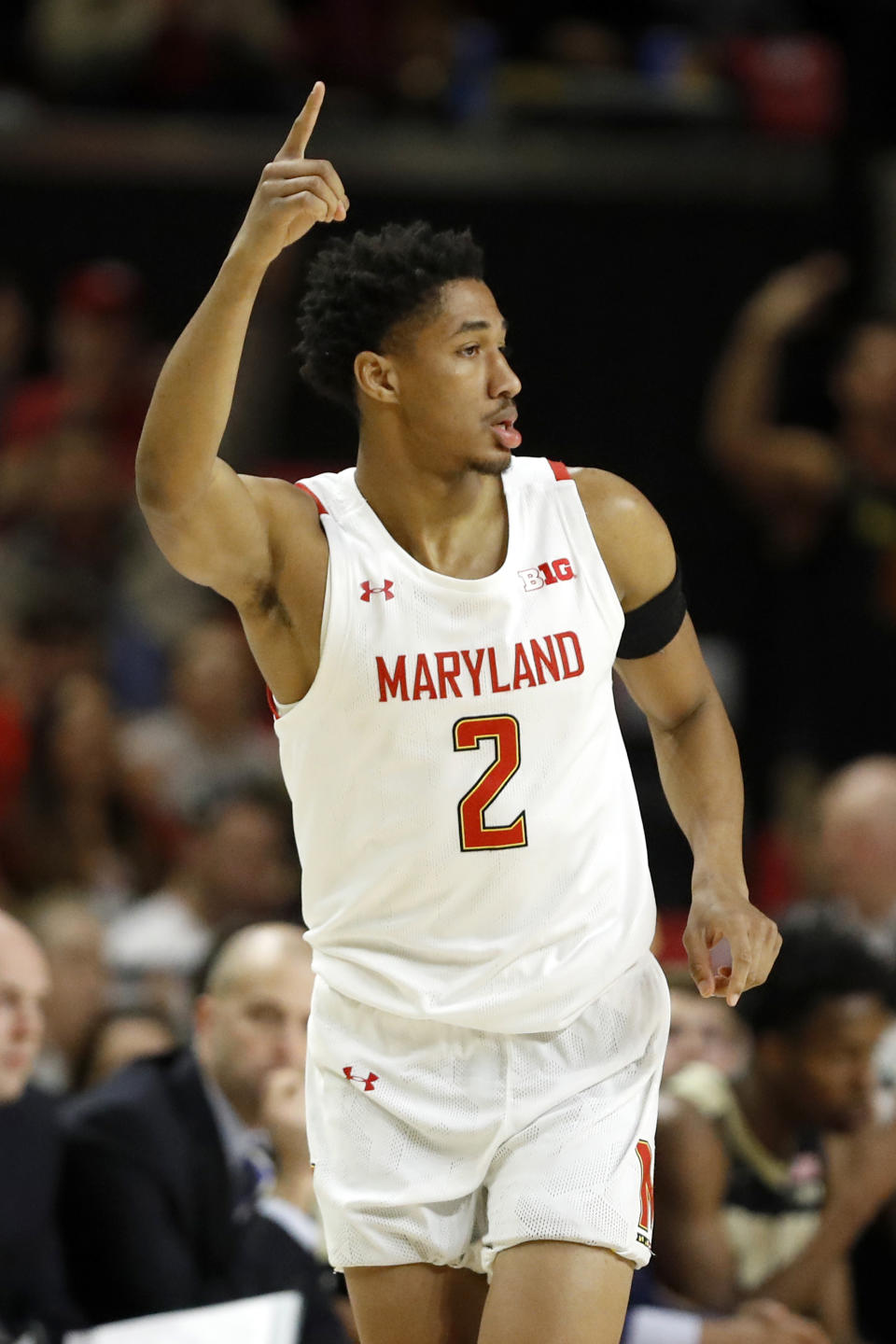 Maryland guard Aaron Wiggins reacts after hitting a 3-pointer against Purdue during the first half of an NCAA college basketball game, Saturday, Jan. 18, 2020, in College Park, Md. (AP Photo/Julio Cortez)