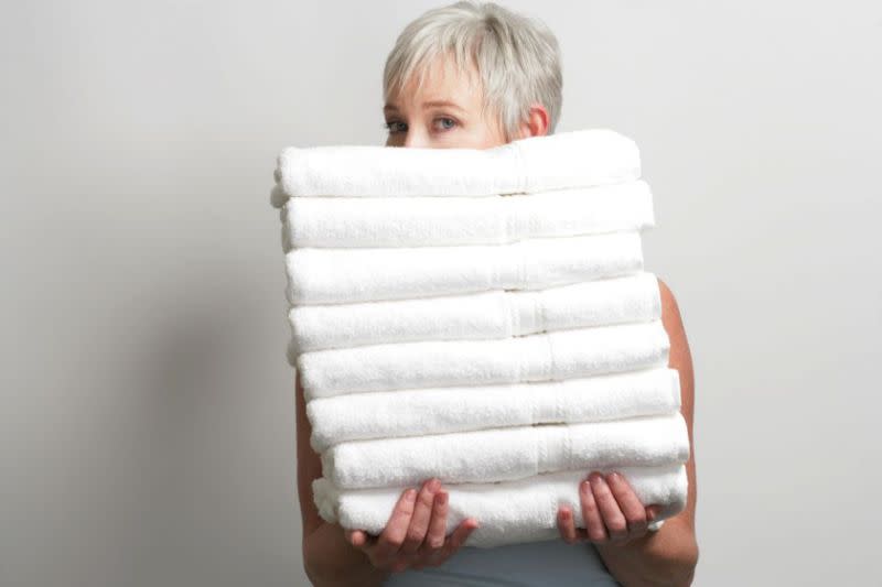 Experts claim you should be washing your kitchen towels every day and your bath towels every three days. Photo: Getty Images