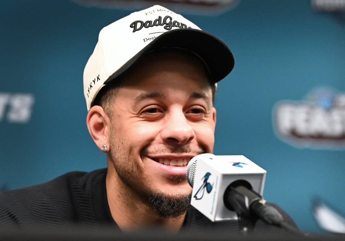 Charlotte Hornets guard Seth Curry smiles as he responds to a question during an interview with the local media at Spectrum Center on Monday, April 15, 2024.