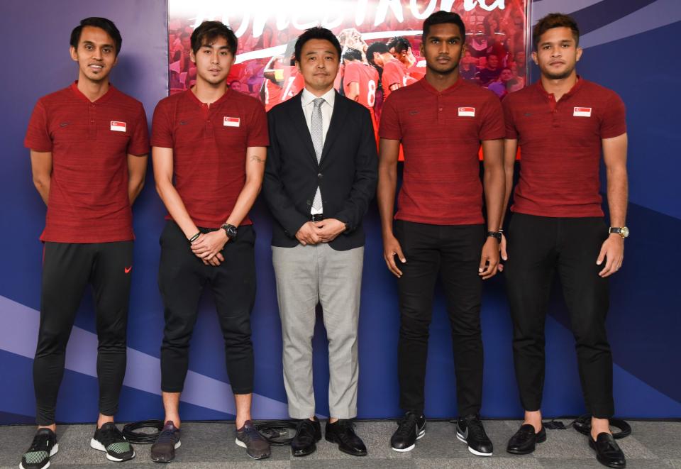 Newly-appointed Singapore national football coach Tatsuma Yoshida (centre) with Lions players (from left) Shahdan Sulaiman, Gabriel Quak, Hariss Harun and Zulfahmi Arifin. (PHOTO: Football Association of Singapore)