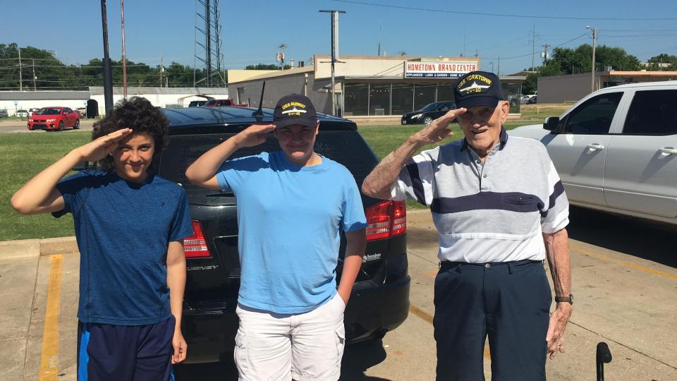 Carter and Jack Hanson with WWII veteran Robert Harding.  / Credit: Scott Hanson