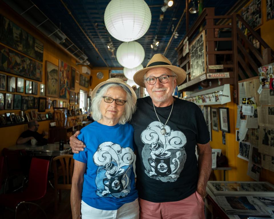 Kim and Orin Domenico stand inside their local business Cafe Domenico in Utica on Wednesday, July 13, 2022.