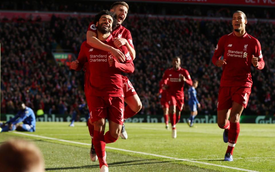 Liverpool's Mohamed Salah celebrates scoring their first goal - Action Images via Reuters
