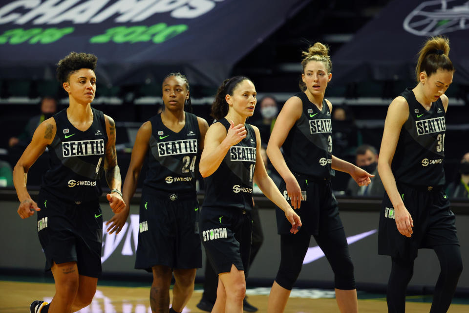 EVERETT, WASHINGTON - MAY 15: (L-R) Candice Dupree #4, Jewell Loyd #24, Sue Bird #10, Katie Lou Samuelson #33 and Breanna Stewart #30 of the Seattle Storm look on during the second quarter against the Las Vegas Aces at Angel of the Winds Arena on May 15, 2021 in Everett, Washington. NOTE TO USER: User expressly acknowledges and agrees that, by downloading and or using this Photograph, user is consenting to the terms and conditions of the Getty Images License Agreement. (Photo by Abbie Parr/Getty Images)