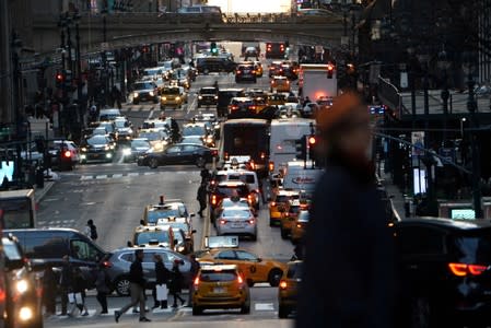 FILE PHOTO: Traffic is pictured at twilight along 42nd St. in Manhattan
