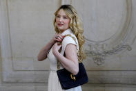 Actress and singer Haley Bennett poses before Dior Haute Couture Spring/Summer 2020 fashion collection, Monday Jan.20, 2020 in Paris (AP Photo/Christophe Ena)