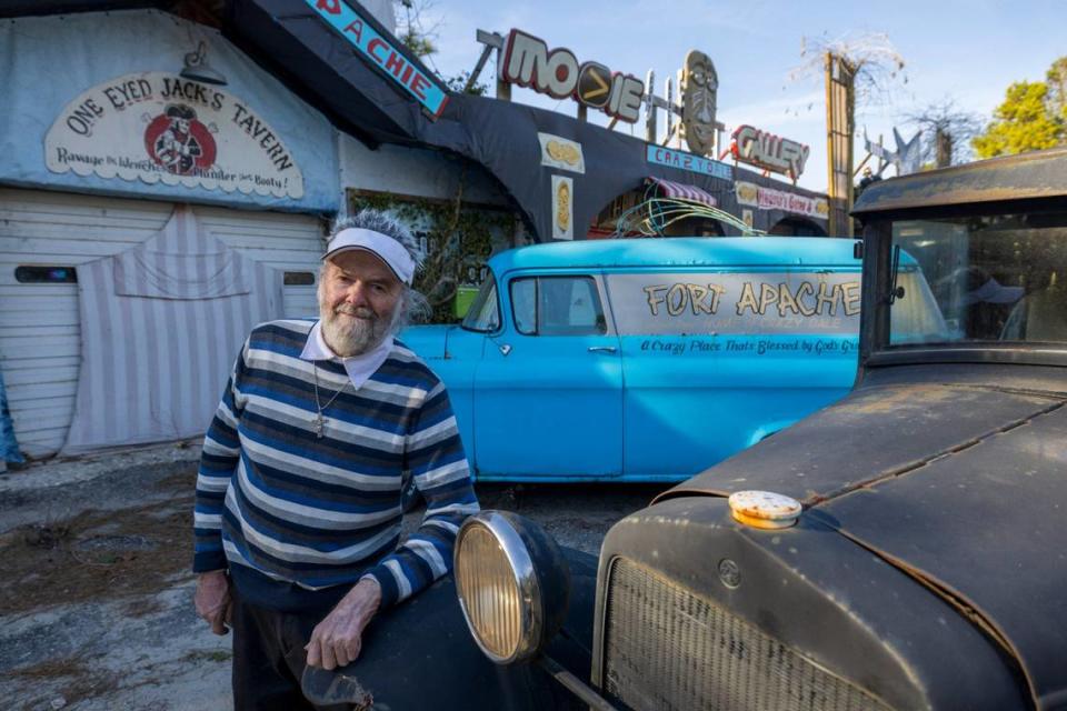 “Crazy Dale” Varnam photographed at his Fort Apache on Thursday, February 22, 2024 in Varnamtown, N.C. Fort Apache, Varnam’s creation is an odd collection of old cars, mannequins, toilet bowls, signs and Christmas lights.