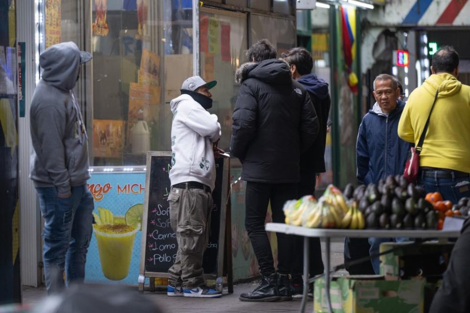 The Post spotted 10 men camped out along Roosevelt Avenue hawking fake IDs for anywhere between $80 and $250. J.C. Rice