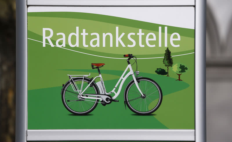 FILE PHOTO: A fuel station for e-bikes is pictured in the historic city centre of the western German city of Koblenz, March 1, 2016. REUTERS/Wolfgang Rattay