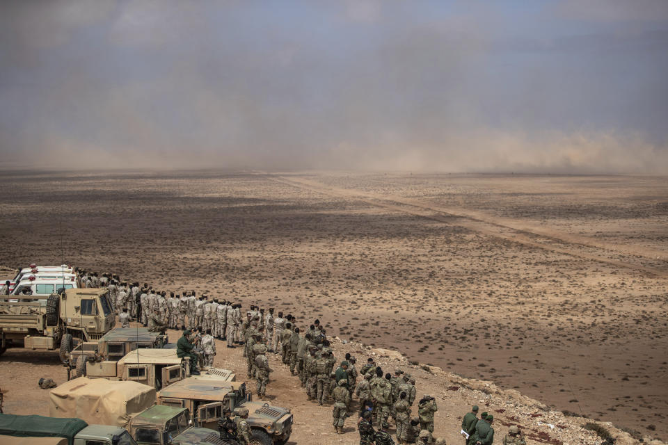 U.S, Morocco and Senegalese military forces observe a large scale drill as part of the African Lion military exercise, in Tantan, south of Agadir, Morocco, Friday, June 18, 2021. The U.S.-led African Lion war games, which lasted nearly two weeks, stretched across Morocco, a key U.S, ally, with smaller exercises held in Tunisia and in Senegal, whose troops ultimately moved to Morocco. (AP Photo/Mosa'ab Elshamy)