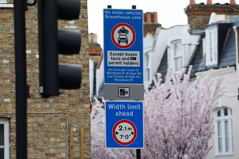 A sign warning drivers of traffic cameras off New Kings Road, Fulham