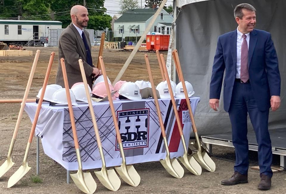 Erie School District Superintendent Brian Polito, right, gets ready to grab a shovel with Neal Brokman, the district's assistant superintendent for operations, at the groundbreaking ceremony for the new Edison Elementary School on East Lake Road on Monday. In the background is the construction site, just south of the existing school.