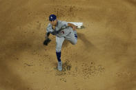 Los Angeles Dodgers starting pitcher Julio Urias throws against the Tampa Bay Rays during the first inning in Game 4 of the baseball World Series Saturday, Oct. 24, 2020, in Arlington, Texas. (AP Photo/David J. Phillip)