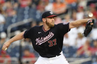 Washington Nationals starting pitcher Stephen Strasburg delivers during the third inning of a baseball game against the Baltimore Orioles, Friday, May 21, 2021, in Washington. (AP Photo/Nick Wass)