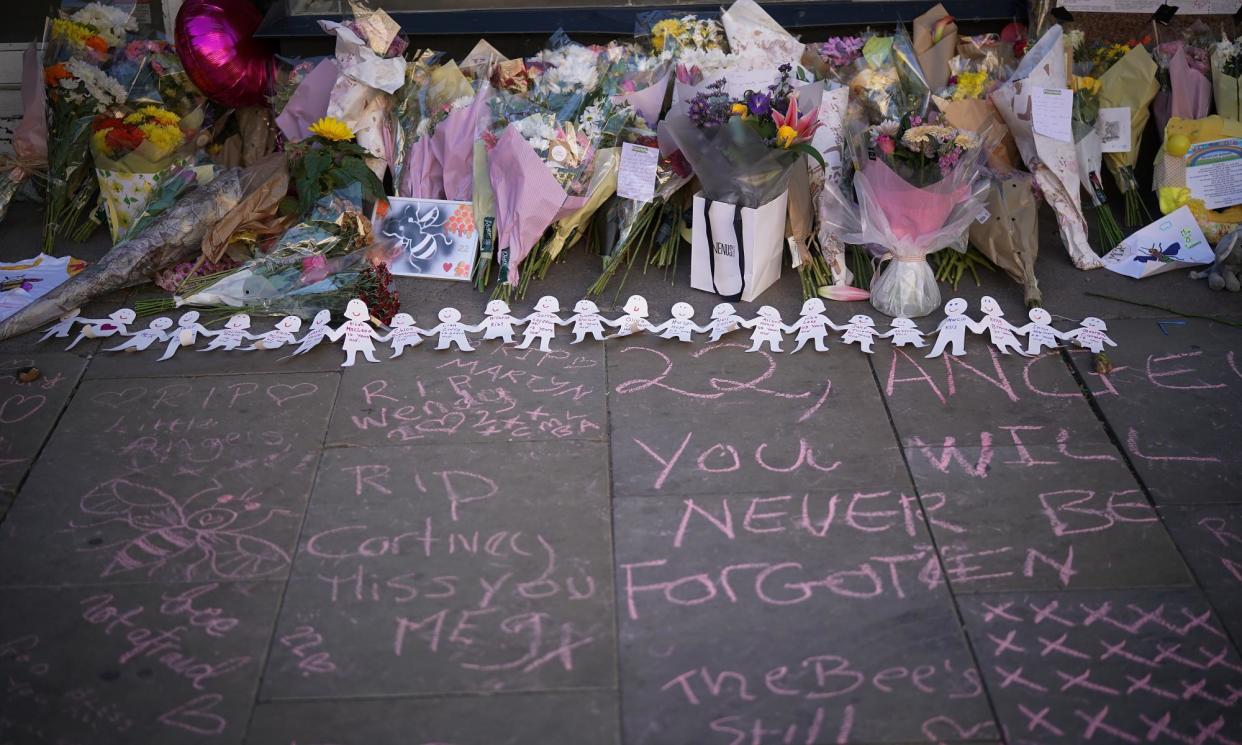 <span>Floral tributes in St Ann’s Square, Manchester in 2018, on the first anniversary of the attack.</span><span>Photograph: Christopher Furlong/Getty Images</span>