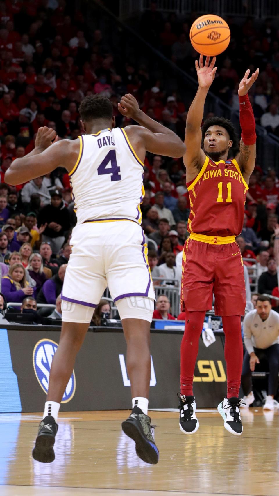 Iowa State guard Tyrese Hunter (11) hits a threepoiubnt basket during the second half in the first round game of the 2022 NCAA Men's Basketball Tournament Friday, March 18, 2022 at Fiserv Forum in Milwaukee, Wis. Iowa State beat LSU 59-54.