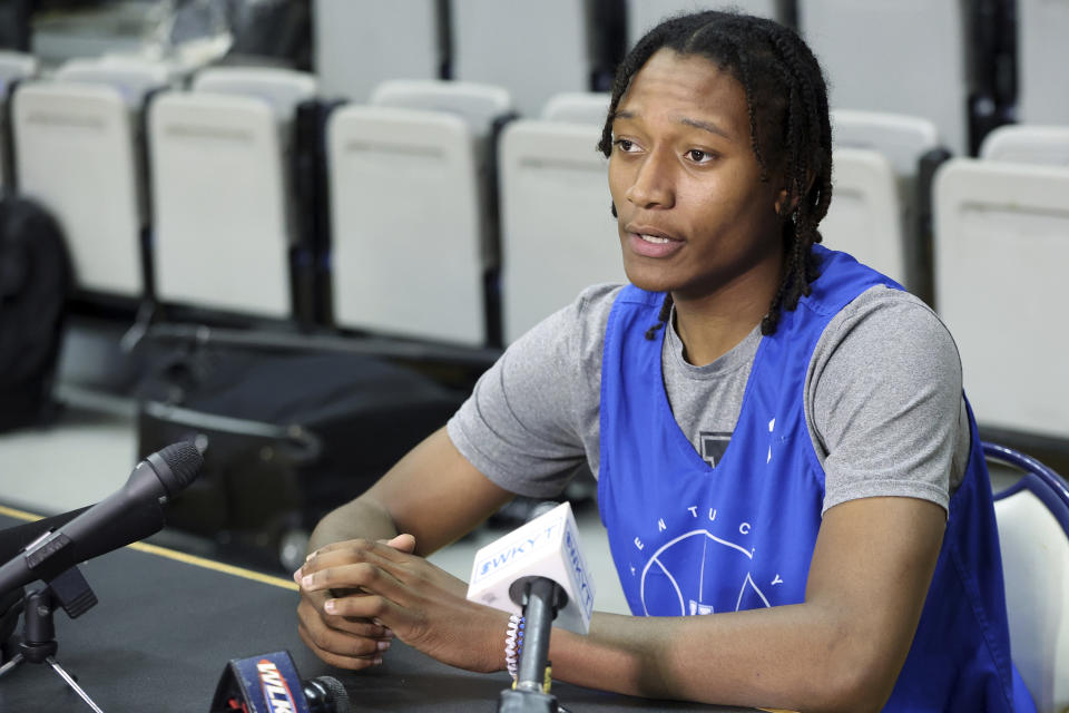 Kentucky's TyTy Washington Jr. answers a question during the school's NCAA college basketball media day in Lexington, Ky., Wednesday, Oct. 20, 2021. (AP Photo/James Crisp)