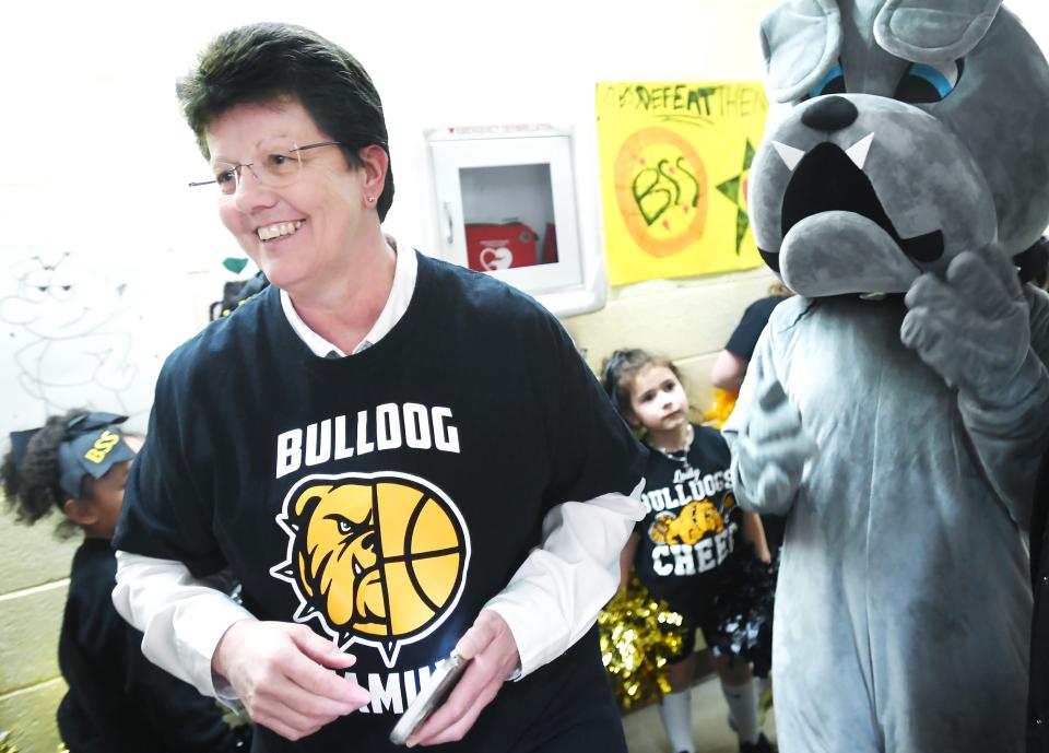 Erie Benedictine Sister Katherine Horan, 59, gets ready for a pep rally at Blessed Sacrament School, where she serves as principal, in Erie on Feb. 15.