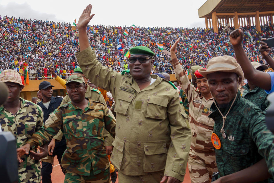 Mohamed Toumba, center, one of the leading figures of the post-coup government in Niger, which calls itself the National Council for the Protection of the Fatherland, attends a pro-coup rally at a stadium in Niamey, the capital city of Niger, August 6, 2023. / Credit: Balima Boureima/Anadolu Agency/Getty