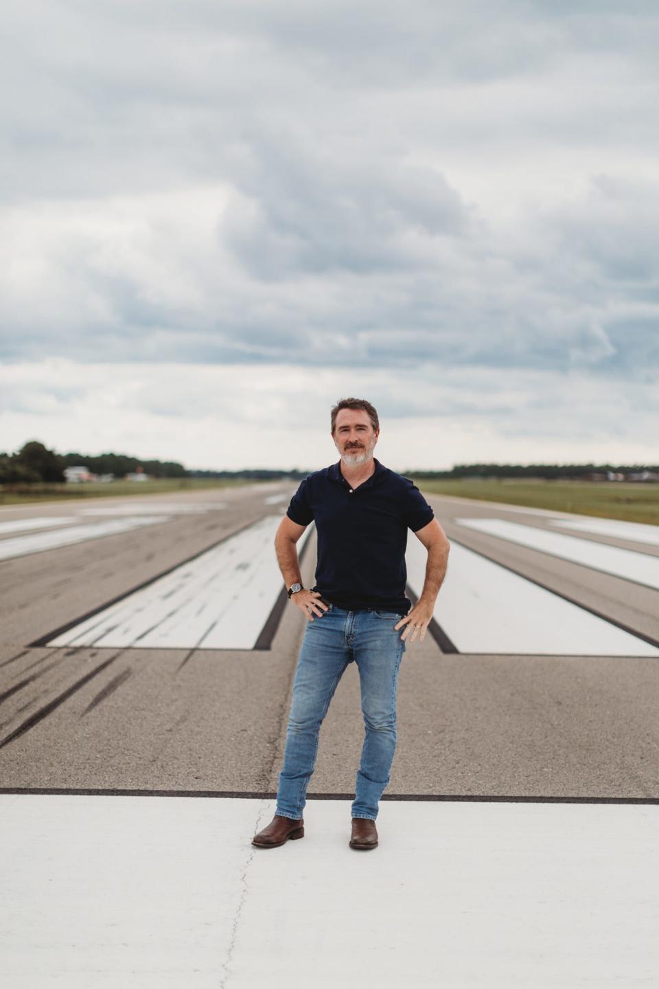 Wilmington-based writer Wiley Cash at the Cape Fear Regional Jetport in Oak Island, which plays a big part in his fourth novel, "When Ghosts Come Home." The character-driven mystery was released Sept. 21.